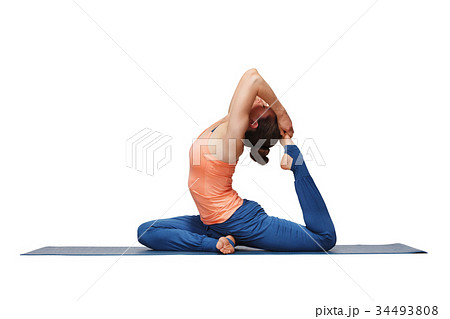 Woman doing Hatha yoga asana Eka pada 34493808
