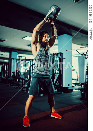 Fitness Kettlebells swing exercise man workout at Fitness Kettlebells swing exercise man workout at 34495139