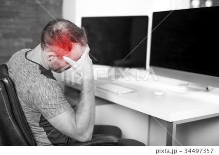 Young business man with problems and stress in the Young business man with problems and stress in the 34497357