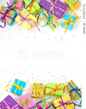 Colored gift boxes with colorful ribbons. Colored gift boxes with colorful ribbons. 34497741
