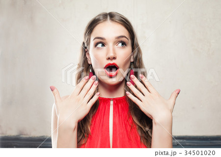 Christmas Woman in Santa Hat. Fashion Model  34501020