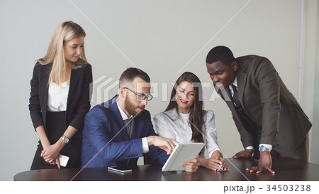Business people sit and have informal meeting Business people sit and have informal meeting 34503238
