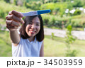 short hair young woman showing the pregnancy test 34503959