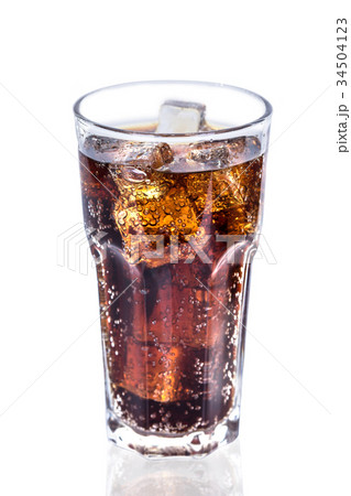 Cola in glass with ice on white background . 34504123