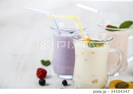 Smoothies or yogurt with fresh berries. Smoothies or yogurt with fresh berries. 34504347