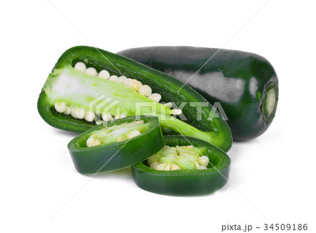 green jalapeno peppers with half slice isolated  34509186