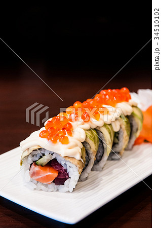 Salmon and Tuna maki roll sushi 34510102