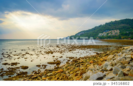 Rocky beach at sunset. Beautiful gold sundown Rocky beach at sunset. Beautiful gold sundown 34516802