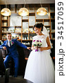 Newlyweds at the bar scene, the bride laughs 34517059