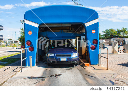Automated portal carwash, a car running through. 34517241