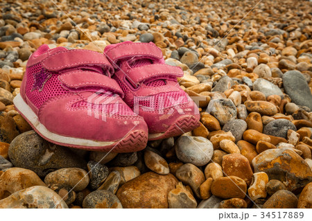 Shoes on pebbles 34517889
