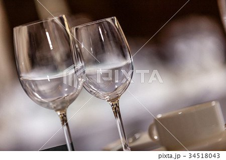 Wine glasses on a table 34518043