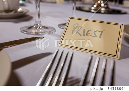 Priest seat at the wedding reception 34518044