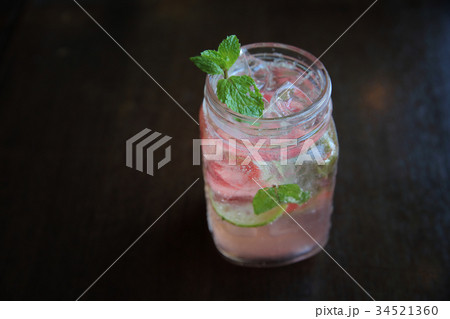 strawberry cocktail on wood background 34521360