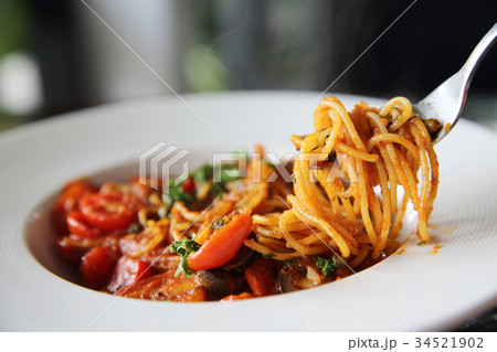 Spaghetti witn tomato and olive , Italian food Spaghetti witn tomato and olive , Italian food 34521902