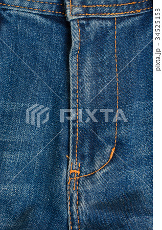 Texture of Blue Denim Jeans (Part of Trousers). 34525153