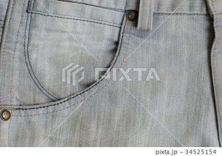 Texture of Gray Denim Jeans (Part of Trousers). 34525154