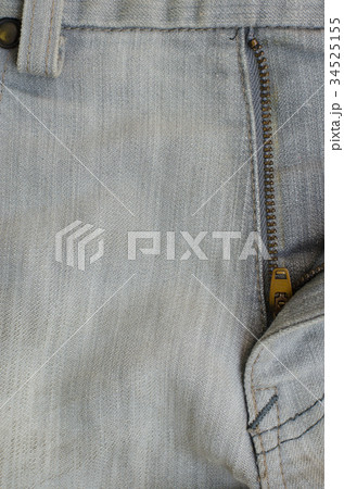 Texture of Gray Denim Jeans (Part of Trousers). 34525155