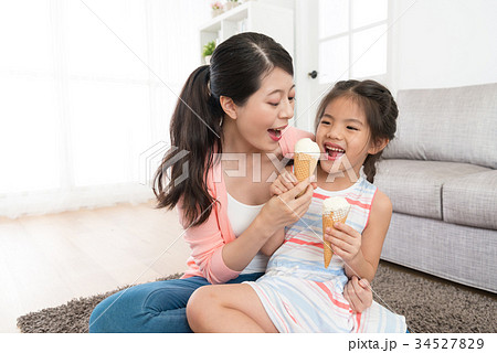 happy pretty daughter children playing with mother 34527829