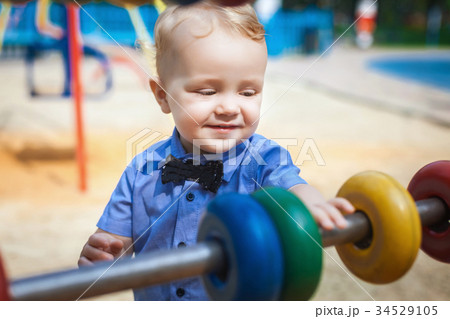 happy child walks in the park in summer happy child walks in the park in summer 34529105