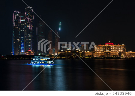 Abu Dhabi buildings skyline from the sea at night Abu Dhabi buildings skyline from the sea at night 34535946
