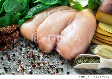 Raw chicken fillet 34537925