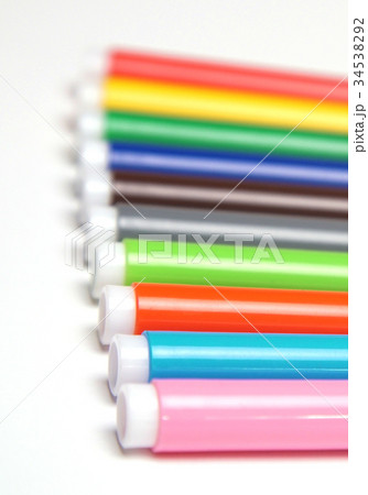 Varicoloured markers on the white isolated 34538292