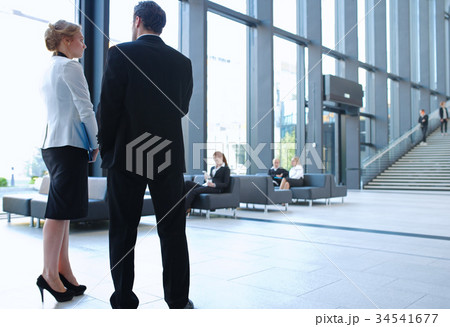 Business people at hall of office building Business people at hall of office building 34541677