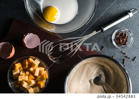 Egg, cream, base sauce and whisk, spices  34542883