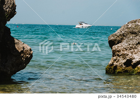 close up on drowning in the lake with boat  34543480