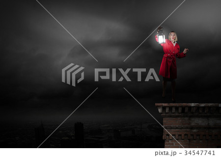 Woman with lantern 34547741