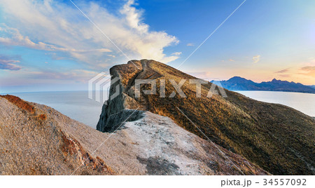 Rocks and sea. Dramatic scene. Rocks and sea. Dramatic scene. 34557092