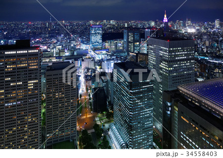 ドコモタワーのライトアップと都市風景 34558403