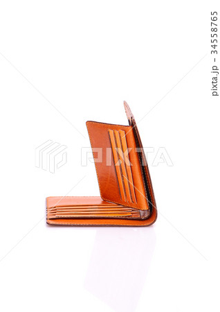One leather purse on a white background One leather purse on a white background 34558765