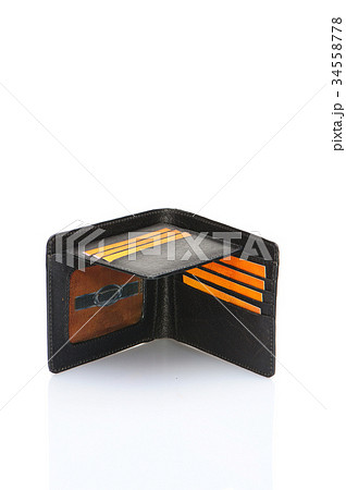 One leather purse on a white background One leather purse on a white background 34558778