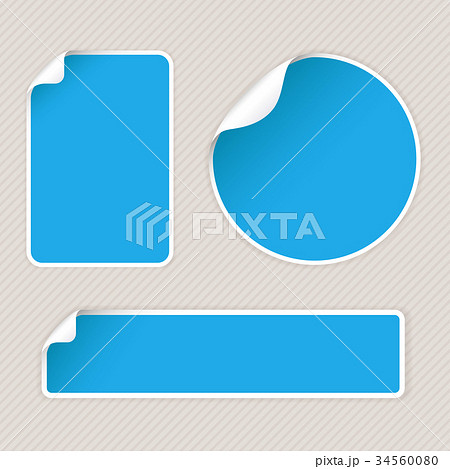 Blue sticker labels with white corner on gray 34560080