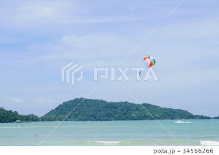 The sky parachute has a blue backdrop background. The sky parachute has a blue backdrop background. 34566266