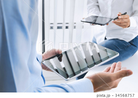 Business executives working together Business executives working together 34568757