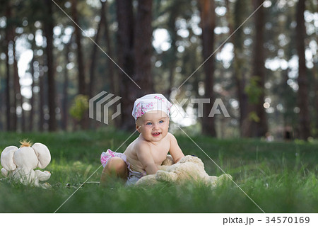 Baby with toys. 34570169