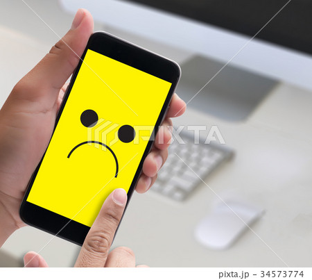 Depressive emotions concept, smiley face Depressive emotions concept, smiley face 34573774