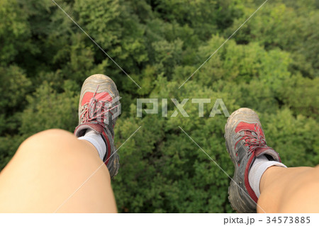 hiker legs on the top of forest 34573885