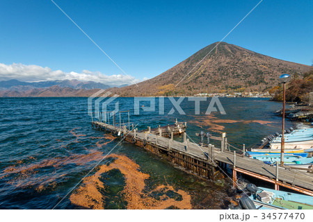 Lake Chuzenji in autumn season, Nikko, Japan. 34577470