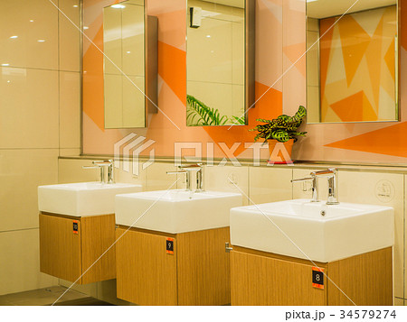 Interior of bathroom with sink basin faucet. Interior of bathroom with sink basin faucet. 34579274
