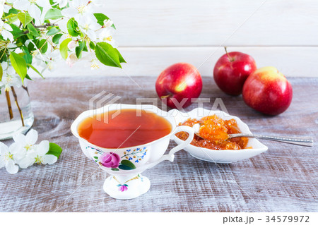 Breakfast tea with fruits and apple confiture. Breakfast tea with fruits and apple confiture. 34579972