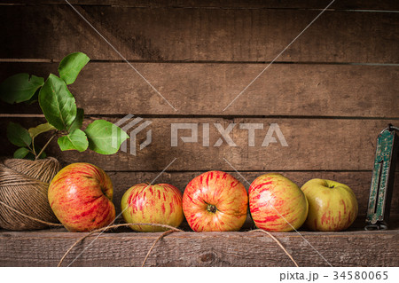 fresh apples on a wooden table fresh apples on a wooden table 34580065