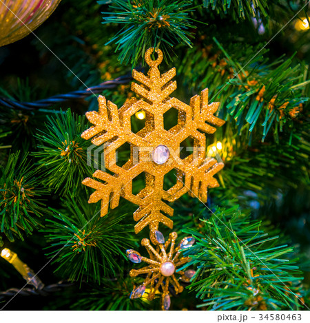 Christmas decorations on the branches of fir tree 34580463