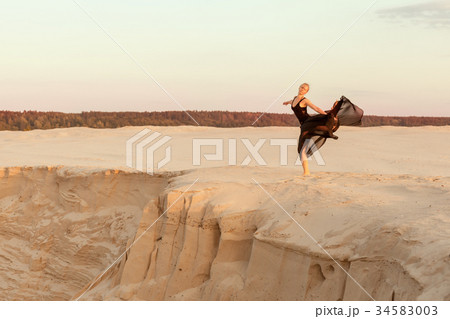 Dancer in the sand. 34583003
