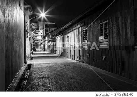 Urban city alley at night 34586140