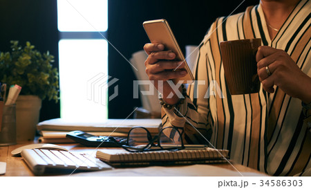 Checking smartphone 34586303