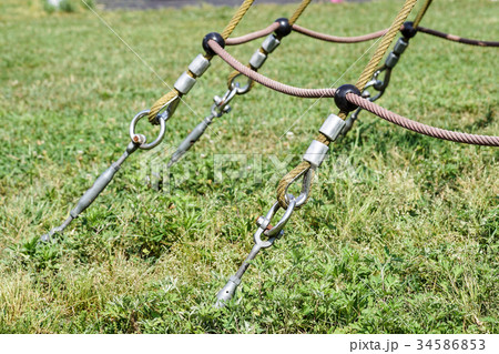 End of swinging rope hang on metal construction in End of swinging rope hang on metal construction in 34586853